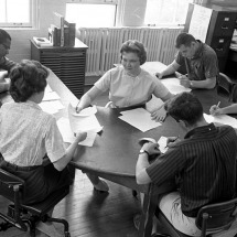 Working at the University Hall copy desk rim, circa 1960s