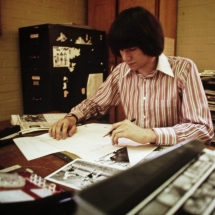 1975-76 editor Mark Glover edits copy