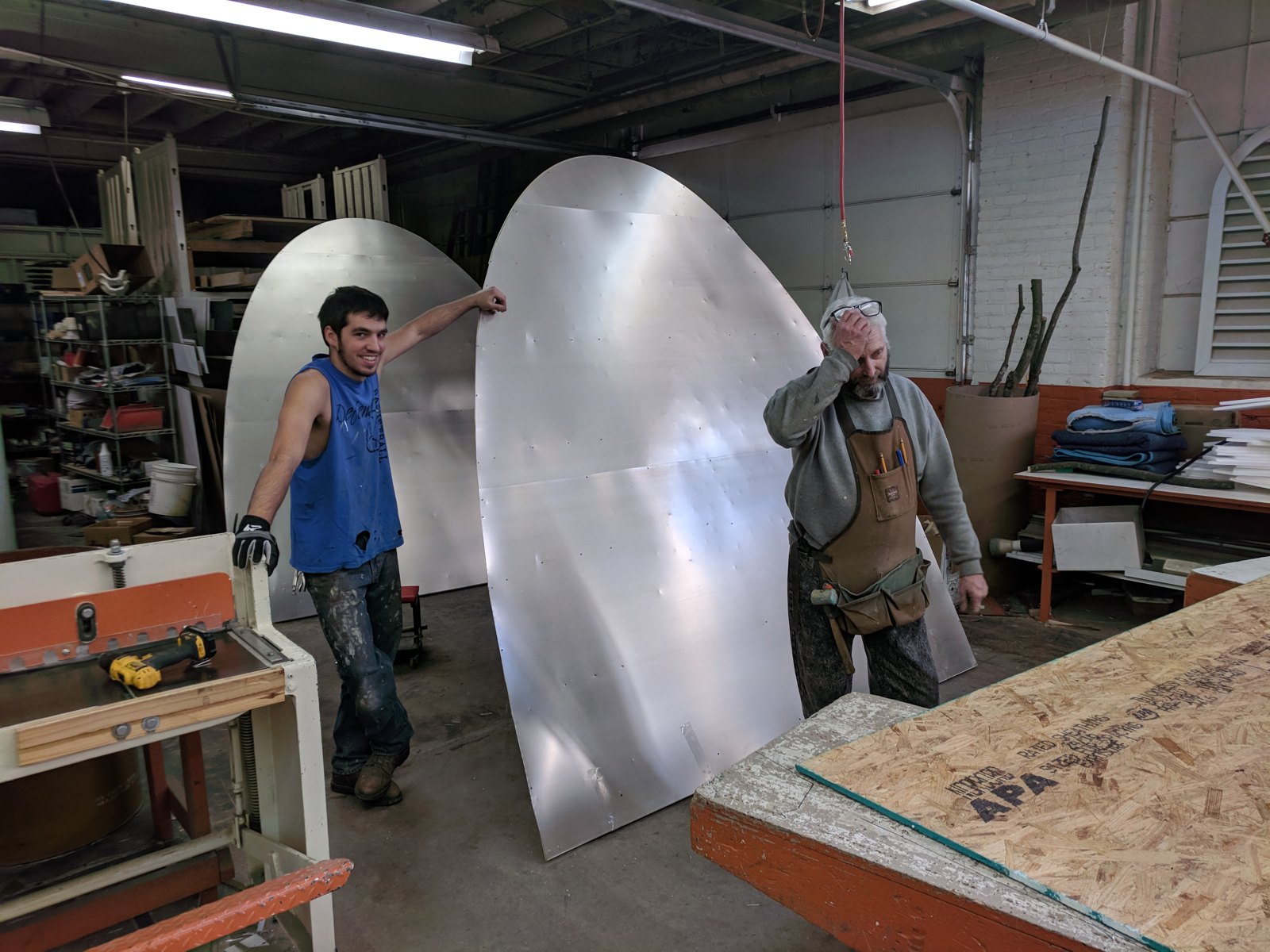 Craftsmen fabricating architectural metal in the Decor shop